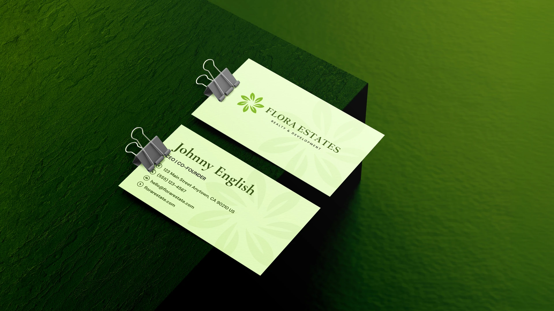 Flora Estates logo shown on a business card mockup